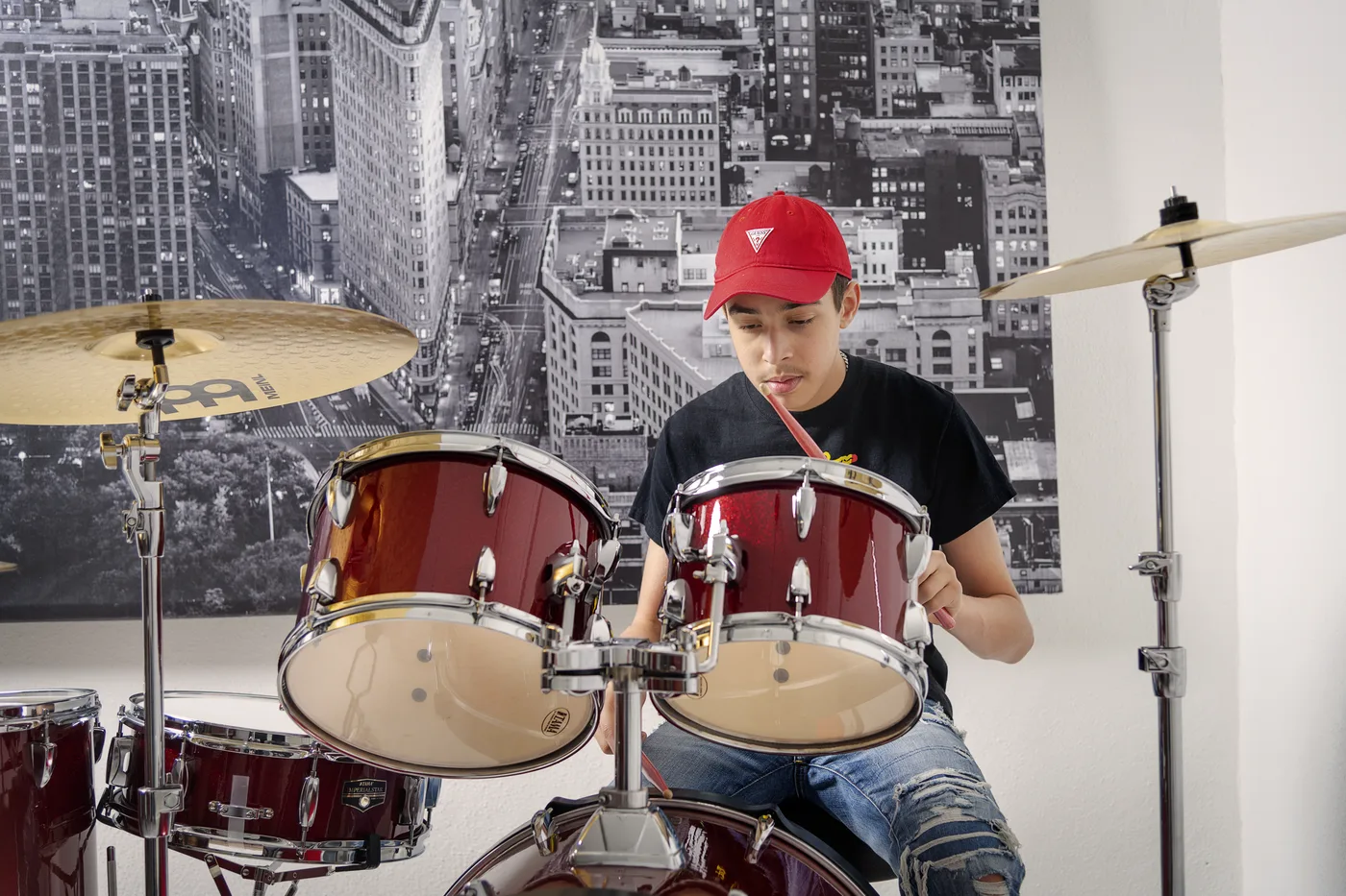 Child playing the drums